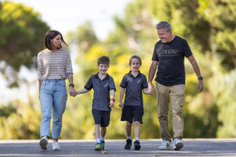 Rebecca May and son Jensen with Peter Clarke and daughter Bella.  The children have just completed their first full term at school - but had to wait until grade two to do it.