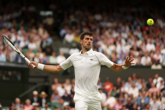 Novak Djokovic of Serbia plays a forehand against Soo<em></em>nwoo Kwon of South Korea.