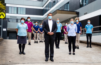 Dr Harry Pannu, CEO of Arcadia Pittwater rehabilitation hospital, with staff he says he will need to stand down if more private hospitals are not engaged to assist in the pandemic effort.
