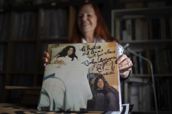 Minnie Yorke with a signed and dedicated Life With the Lions album by John Lennon and Yoko Ono. 
