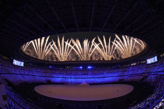 Fireworks light up the stadium at the start of the opening ceremony of the Tokyo Games.