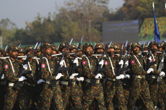 Soldiers march in Myanmar’s capital Naypyitaw in February.