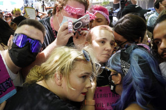 Britney Spears supporters listen to a feed from the courtroom outside a hearing in Los Angeles on June 23. 