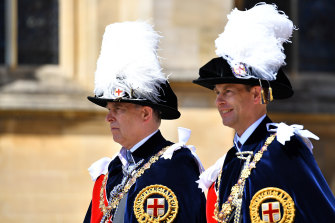 Prince Andrew, left, and his brother Prince Edward in the procession to the Order of The Garter Service at Windsor Castle in 2019.