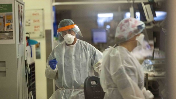 Healthcare workers inside one of the coronavirus wards at the Austin Hospital this week.