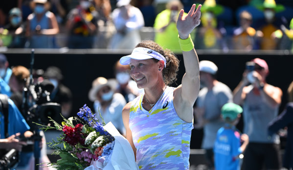 Sam Stosur waves to the crowd after her final Australian Open singles match last year.