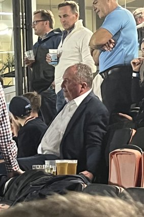 Thirsty work: Barnaby Joyce at the rugby.