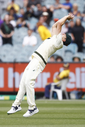 Australian captain Pat Cummins takes a catch.
