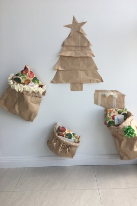 Sandy Duffield has made Christmas decorations out of the brown paper bags that meals are delivered in.