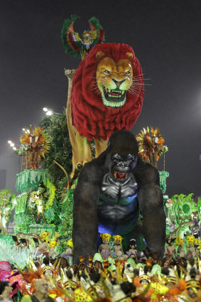 Dancers from the Colorado do Bras samba school perform on a float during a carnival parade in Sao Paulo, Brazil, on Friday.