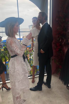 Justin Hemmes bombarded by girls at Mumm pavilion on Derby Day in Melbourne. 