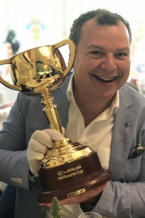 His cup runneth over? Andrew Hornery with this year's Melbourne Cup.
