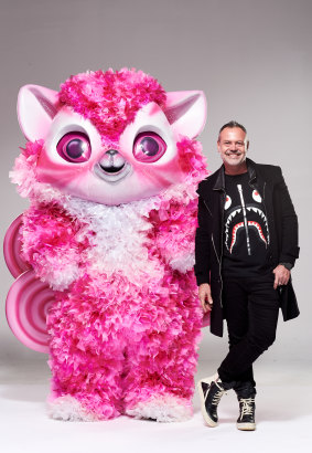Designer Tim Chappel with one of his larger-than-life costumes that a mystery celebrity will wear in the new season of The Masked Singer