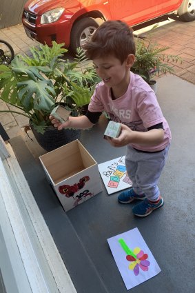 Jamila's four-year-old son painting his ‘kids-only’ post box.