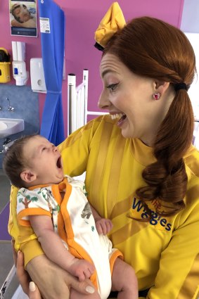 Emma Wiggle meeting one of the tiny patients at the Sydney Children's Hospital, Randwick, on Christmas Day.