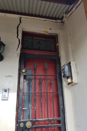 Cracks at the entrance of Dr Angela Livingstone's home prevented her from opening the front door.