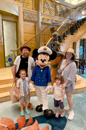 Ben Groundwater and family, plus Mickey Mouse, on board the Disney Wonder.