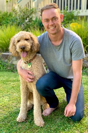 Chad Neylon from Ringwood, with his dog Graham. The Sydney outbreak has meant Neylon won't be able to fly to Perth or even go to a family Christmas event in Melbourne.