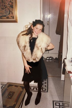 Kate, aged nine, dressing up in clothes from her mother Gai’s wardrobe.