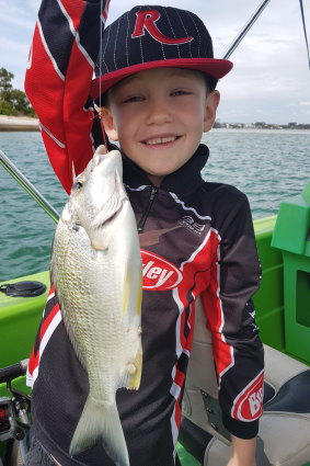 Liam Caddaye, 7, with a lovely little bream caught on bait. Bait fishing is a great way to introduce youngsters to angling.