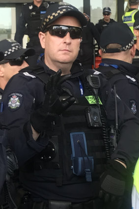 Police have denied that  Senior Constable Travis Gray's hand gesture was used as a ‘white power’ symbol.