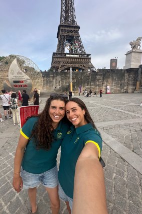 Jess and Noemie Fox in front of the Eiffel Tower after qualifying for the 2024 Olympics in Paris.