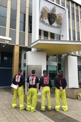 Firefighters outside the ACT Legislative Assembly, where they spoke to politicians this week about the industrial action they are taking against ACT Fire and Rescue.