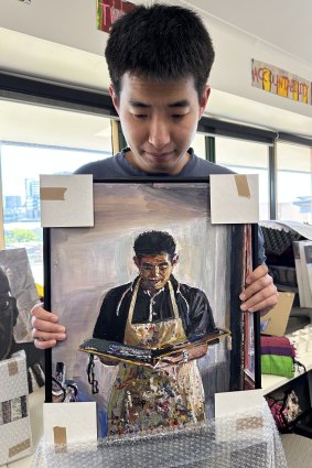 Daniel Kim and his portrait.
