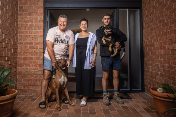 Rob and Georgia Yoannidis, with their son Josh and dogs Simba and Koda, are selling up to move to Queensland.
