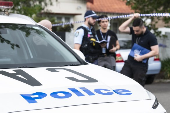 Detectives remain at the scene on Knox Street after the mother of five was found dead in her unit.