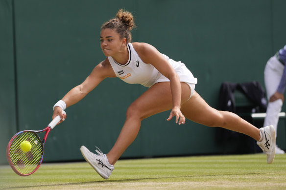 Jasmine Paolini plays a forehand return to Barbora Krejcikova.