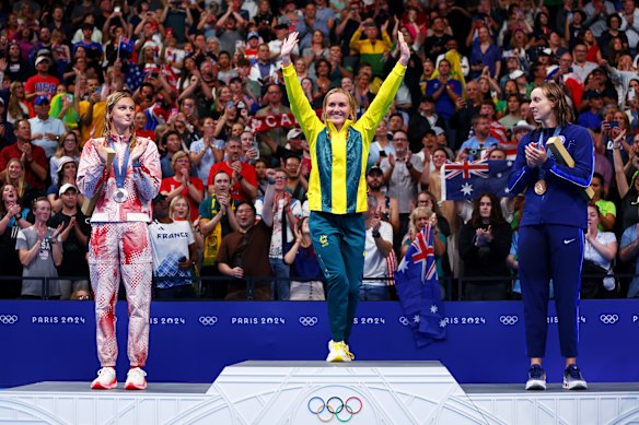 Ariarne Titmus (centre) after winning gold in the women’s 400m freestyle at the 2024 Paris Olympics ahead of Summer McIntosh (left) and Katie Ledecky (right). 
