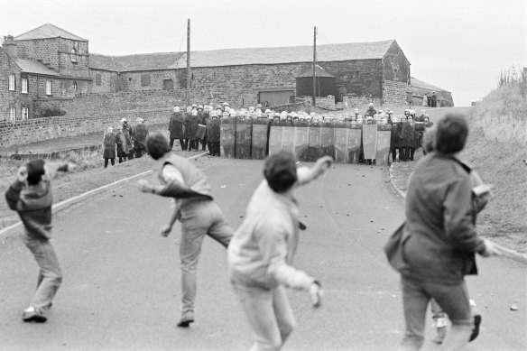 Clashes between striking miners and police in the town of Woolley, England in 1984.