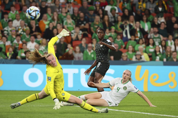 Nigeria’s Asisat Oshoala, kicks the ball past Ireland’s goalkeeper Courtney Brosnan.