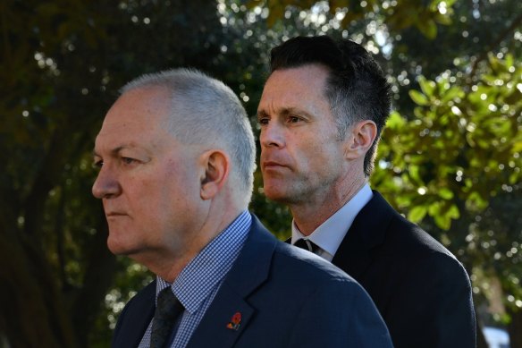 NSW Racing Minister David Harris (left) and Premier Chris Minns answer questions about the greyhound racing industry on Wednesday.