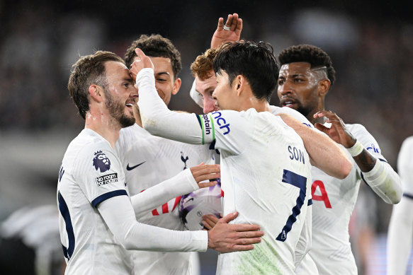 James Maddison of Tottenham Hotspur celebrates with Son Heung-min of Tottenham Hotspur.