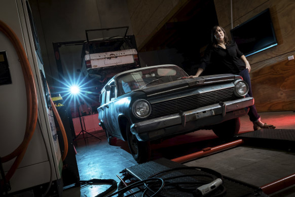 EVolution Australia's Emma Sutcliffe with the 1963 EJ Holden wagon she is turning electric.