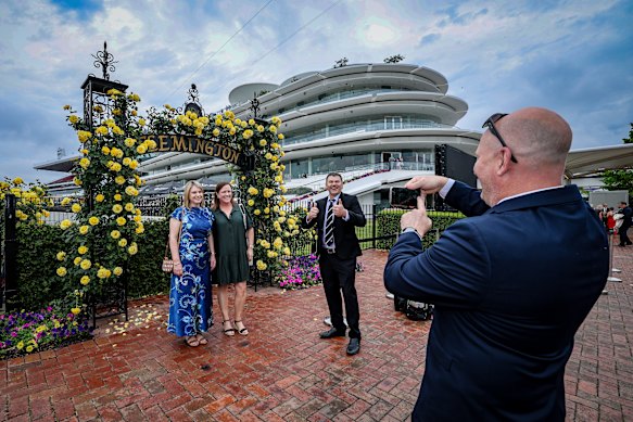 Kane Paues takes a photo of wife Michelle with friends Carolyn and Matt Scott.