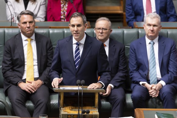 Treasurer Jim Chalmers delivering his May budget speech. The forecast $4.2 billion surplus has increased since then.