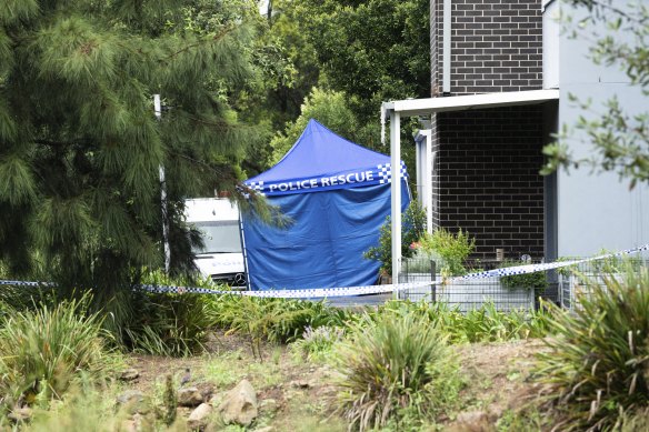 A blue forensics tent was set up outside the Chos’ Baulkham Hills home.