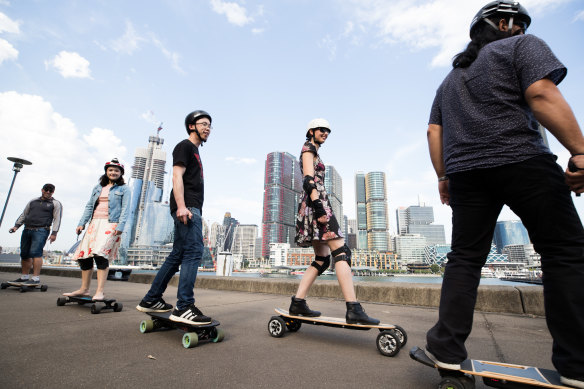 Electric skateboard riders in Pyrmont. 