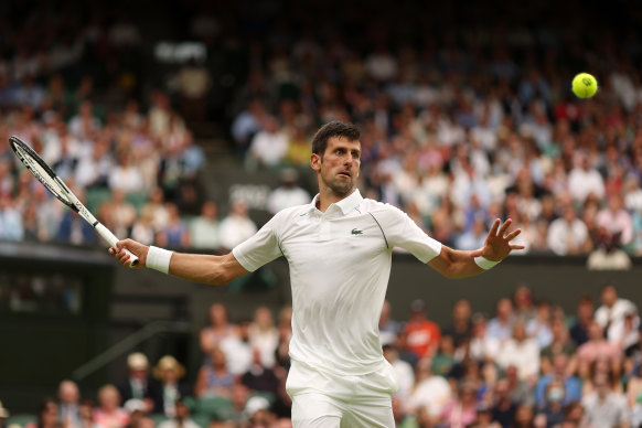 Novak Djokovic of Serbia plays a forehand against Soonwoo Kwon of South Korea.