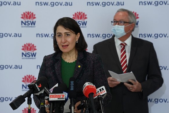 NSW Premier Gladys Berejiklian (left) and NSW Health Minister Brad Hazzard (right) during the COVID-19  update.