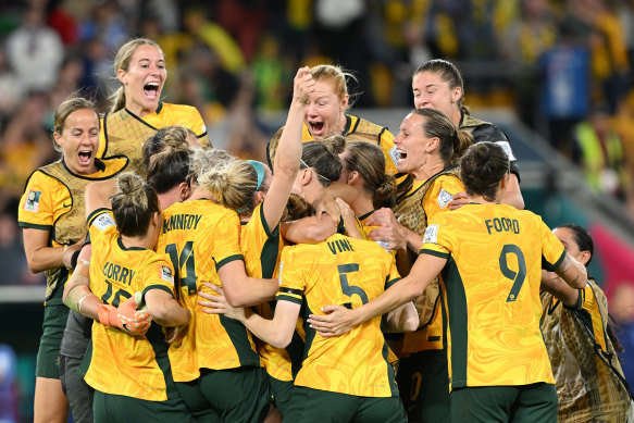 Australia celebrate their side’s victory in the penalty shoot out.