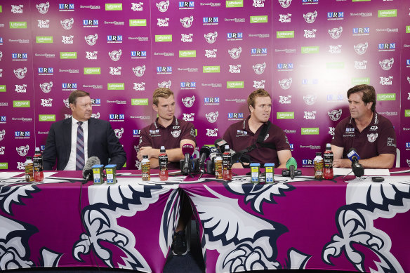 The Trbojevic brothers, Tom and Jake, pictured with coach Des Hasler (far right) and then-club chief executive Stephen Humphreys (far left) in 2019.