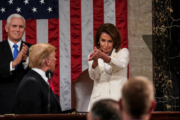 Nancy Pelosi applauding Trump during his 2020 State of the Union speech.