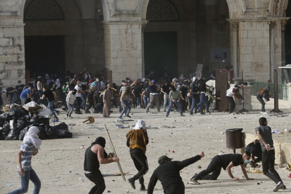 Palestinians clash with Israeli security forces at the Al-Aqsa Mosque compound in Jerusalem’s Old City.