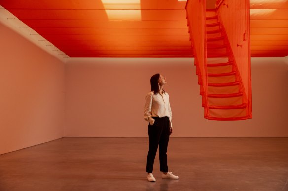 Guest curator Rachel Kent with Do Ho Suh’s “Staircase-III” (2010).