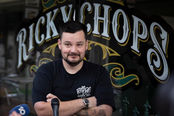 Ricky Jefferies, the man who detained the alleged attacker, outside his barbershop.