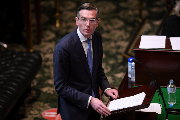 Treasurer Dominic Perrottet delivers his budget in parliament.